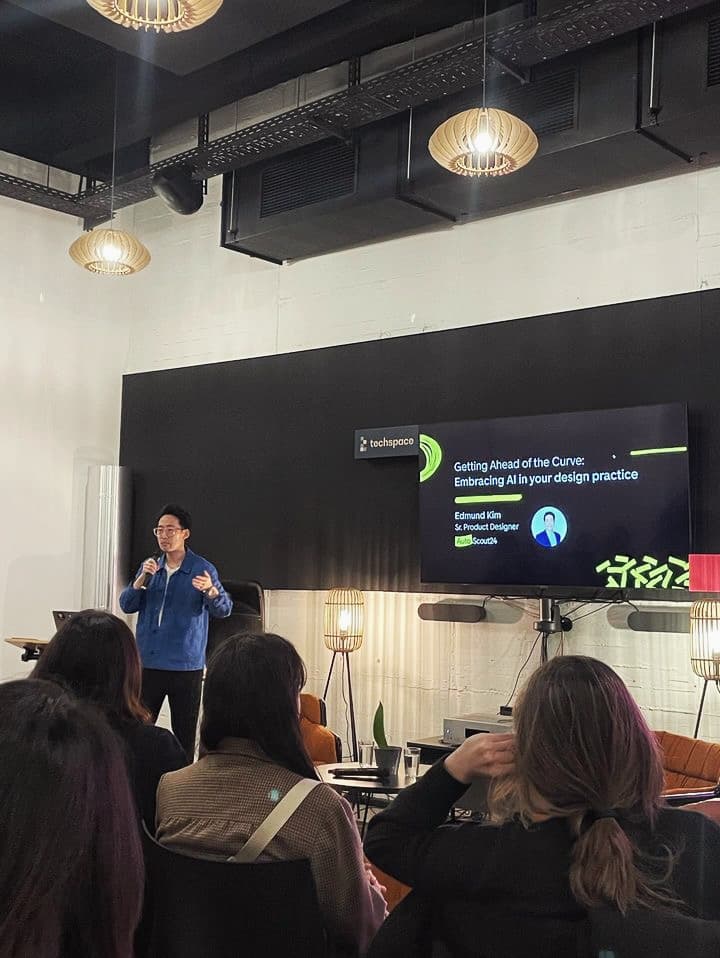 Eddie Kim presenting a talk on embracing AI in design practice at Techspace.