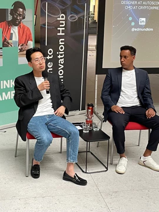 Eddie Kim speaking on a university innovation hub panel about AI and the future of work.