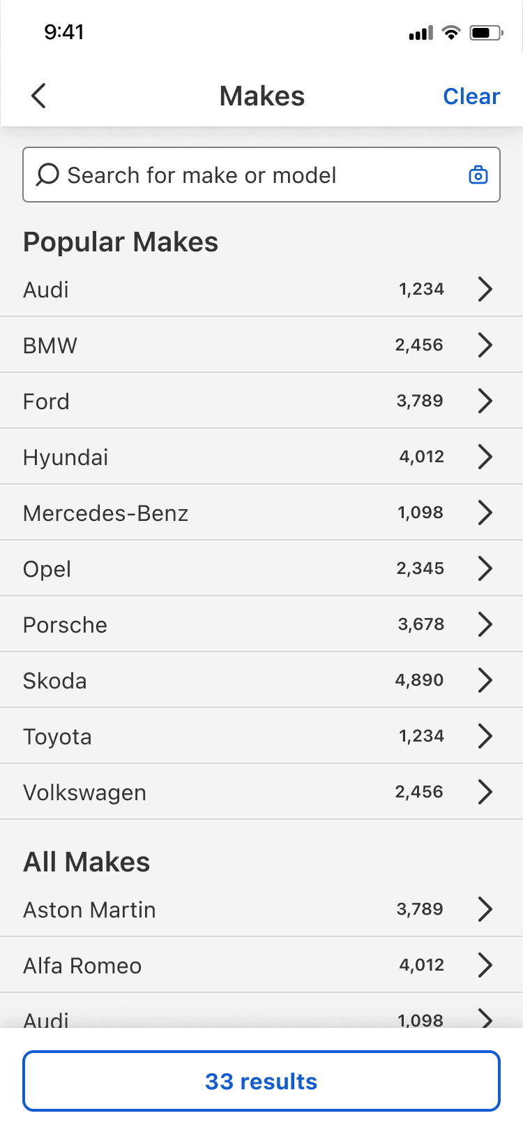 Mobile make screen with a search field, popular makes, and an alphabetical make list.